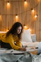 A girl in a yellow - Credits: pexels