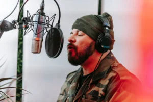 Bearded man in camouflage jacket - Credits: pexels