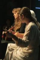 Musicians performing acoustic guitar live - Credits: pexels