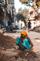 An Indian woman dressed in - Credits: pexels