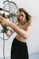 A shirtless person in a - Credits: pexels