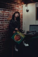 A woman in a leather - Credits: pexels