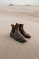 Pair of worn leather boots - Credits: pexels