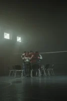 A diverse support group hugs - Credits: pexels