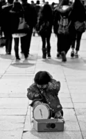 A child sits on an - Credits: pexels