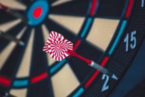 A dart striking the bullseye - Credits: pexels