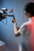 A robotic arm delicately holds - Credits: pexels