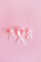 Three pink ribbons symbolize breast - Credits: pexels