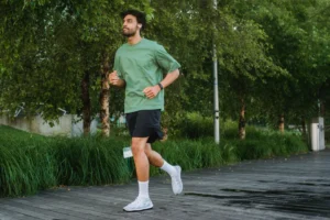 A confident young man jogging - Credits: pexels