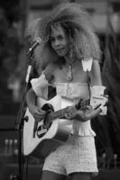 A young woman plays an - Credits: pexels