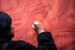 A person writing motivational messages - Credits: pexels