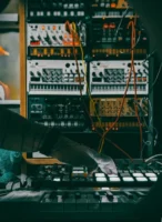 Musician using a synthesizer and - Credits: pexels