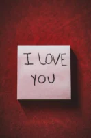 Romantic handwritten note with I - Credits: pexels