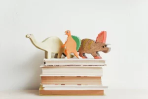 Colorful wooden dinosaurs on top - Credits: pexels