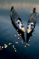 Two boats with lanterns on - Credits: pexels
