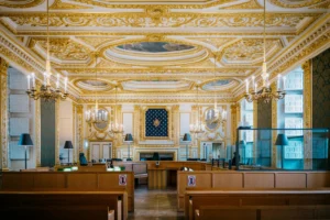 An ornate courtroom with golden - Credits: pexels