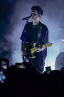 Musician performing with electric guitar - Credits: pexels