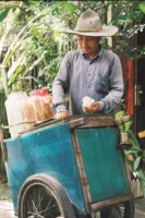 Asian man selling ice cream - Credits: pexels