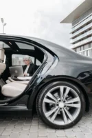 Senior businesswoman using a laptop - Credits: pexels