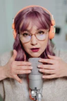 Woman with purple hair and - Credits: pexels