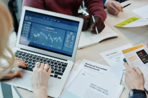 Business professionals analyzing financial data - Credits: pexels