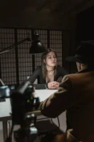 A woman and an investigator - Credits: pexels