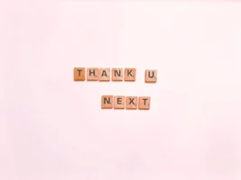 Scrabble tiles display 'Thank U - Credits: pexels