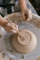 Hands of an artisan expertly - Credits: pexels