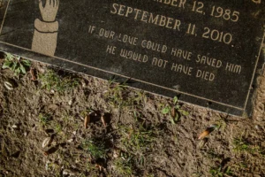 Close-up view of a gravestone - Credits: pexels