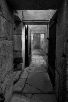 Explore a dimly lit historic - Credits: pexels
