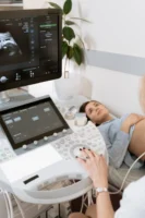 Pregnant woman undergoes ultrasound scan - Credits: pexels