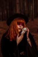 Redhead woman with occult makeup - Credits: pexels