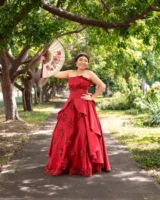 A woman in a stunning - Credits: pexels