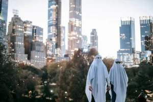 Two people in ghost costumes - Credits: pexels