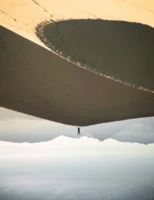 A surreal desert scene featuring - Credits: pexels