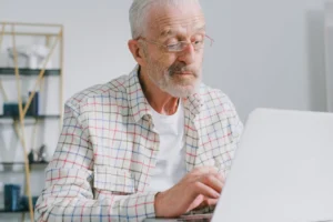 Senior man with eyeglasses working - Credits: pexels