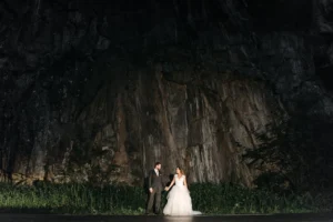 Bride and groom pose romantically - Credits: pexels