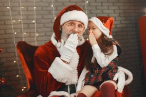 Santa Claus and a young - Credits: pexels