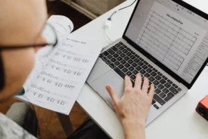 A musician using a laptop - Credits: pexels