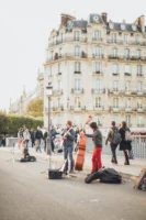 Vibrant street musicians performing near - Credits: pexels
