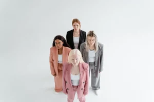 Four women in stylish suits - Credits: pexels