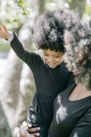 Joyful moment of a mother - Credits: pexels