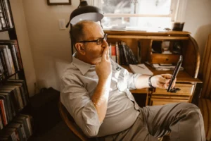 A middle-aged man wearing eyeglasses, - Credits: pexels