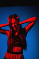 A woman screams with hands - Credits: pexels