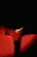 A hand rests on a - Credits: pexels