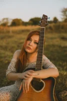 A young woman in a - Credits: pexels