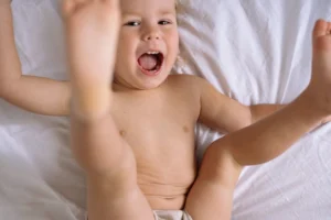 Happy toddler having fun in - Credits: pexels