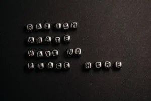 Close-up of black beads spelling - Credits: pexels