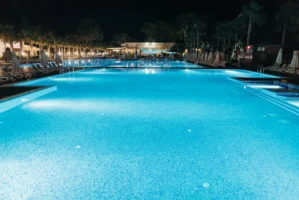 A luxurious resort swimming pool - Credits: pexels