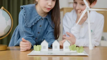 Children exploring wind energy models - Credits: pexels